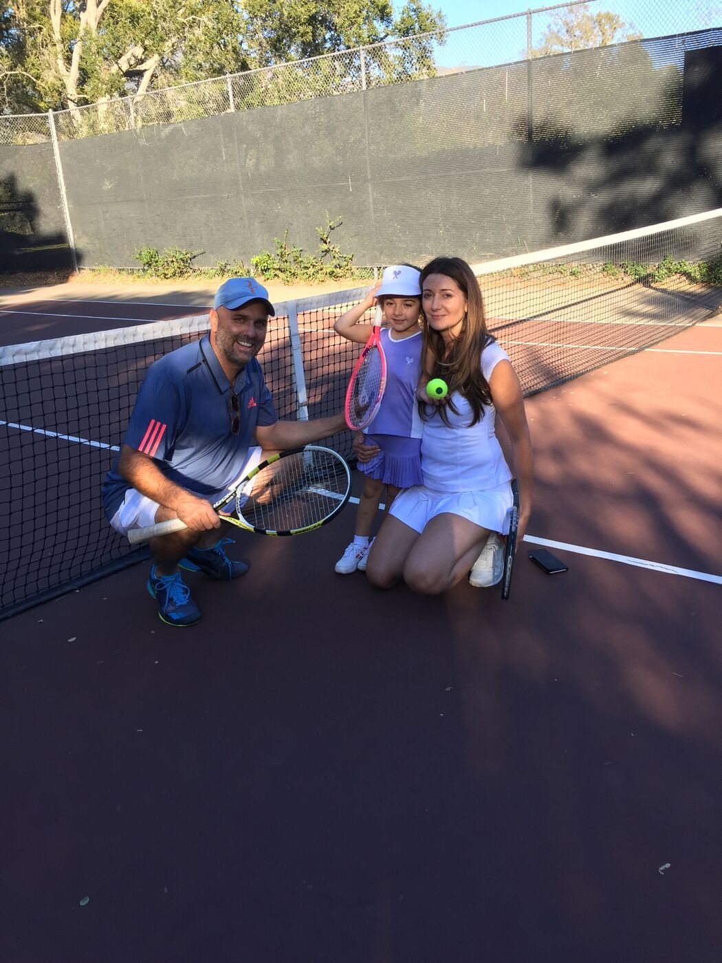 Gabi with Coach Jay Campbell and mom at the net
