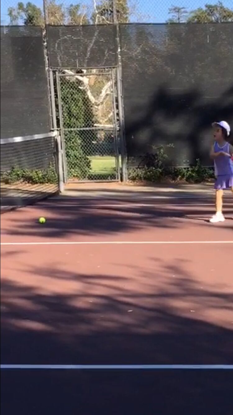 Gabi setting up for a shot on court